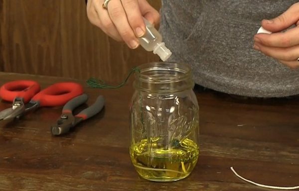 How to Make a Mason Jar Oil Lamp, see more at https://diyprojects.com/mason-jar-olive-oil-lamp