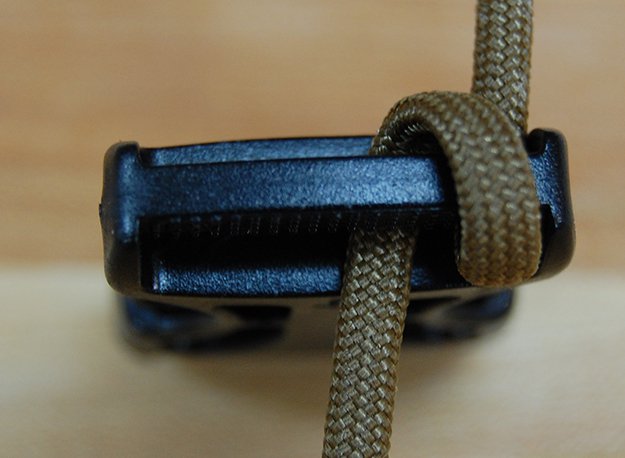 Loop onto the buckle | How To Make A Paracord Belt: Step-By-Step Instructions