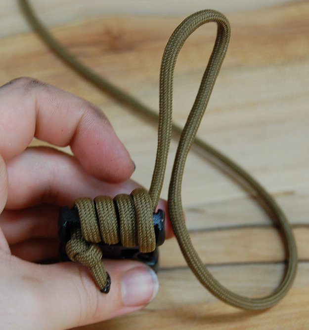 Looping the buckle | How To Make A Paracord Belt: Step-By-Step Instructions