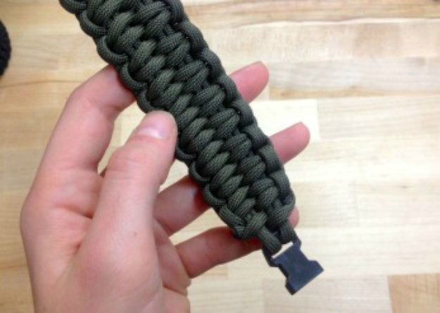 Continue to repeat steps 4 and 5 until you've reached the second buckle | How To Make A Paracord Bracelet: Blaze Bar Quick Deploy | how to make a paracord bracelet | easy paracord bracelet instructions