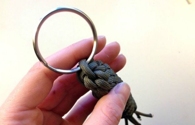 Add keyring to DIY paracord keychain | How To Make A Paracord Keychain