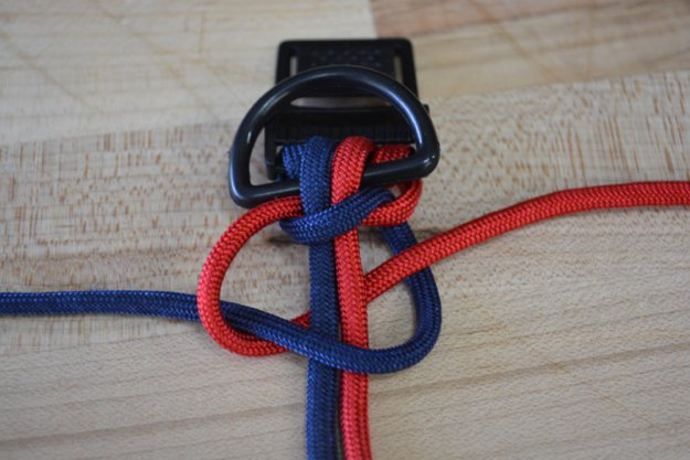 Loop the red cord under the core | Learn To Make A Paracord Dog Collar | Instructions
