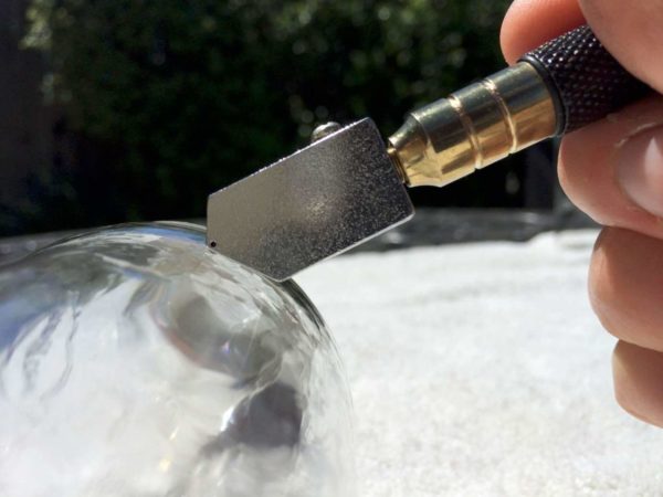 scouring glass, to make a cup out of a glass bottle. Check out the full guide on DIY Projects.com
