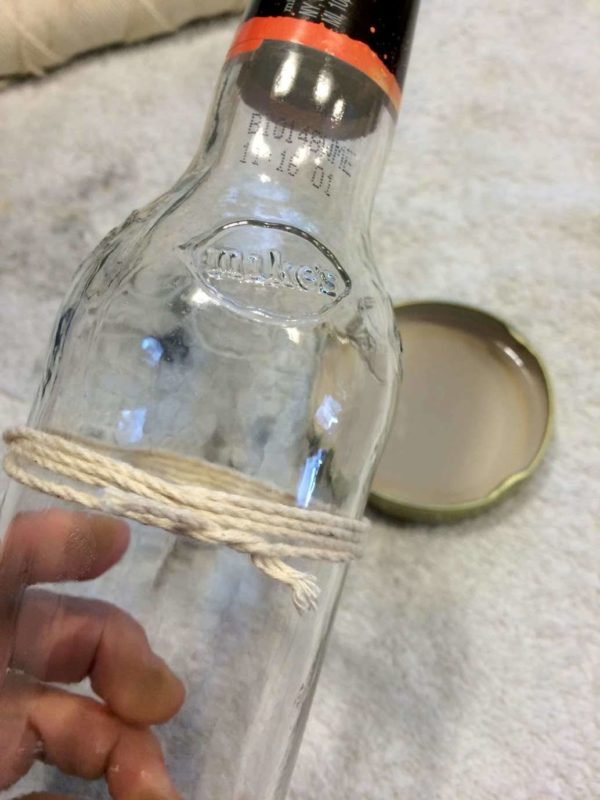 tie a string around the glass to break it. See the complete instructions on DIY Projects.com
