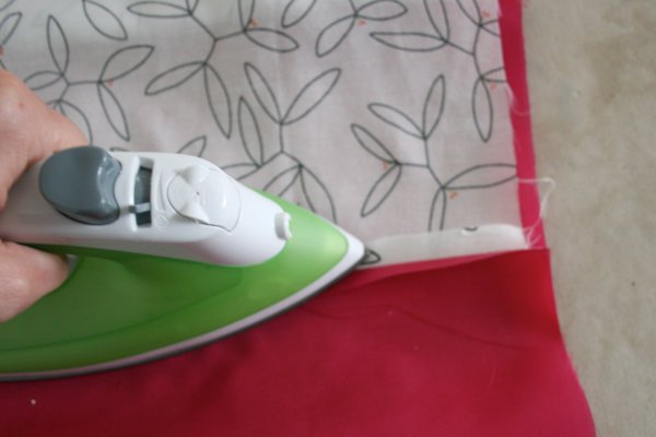 Press the seam flat with an iron | Sewing Tutorials on DIY Projects.com