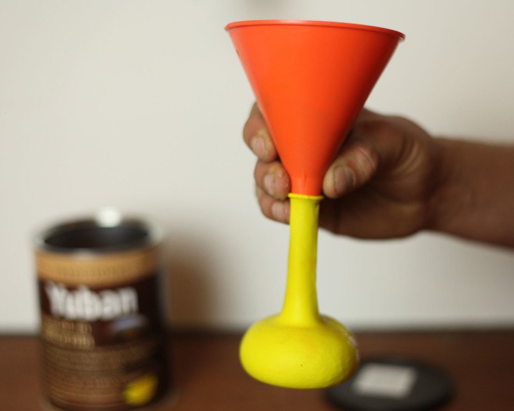 A balloon and a funnel.