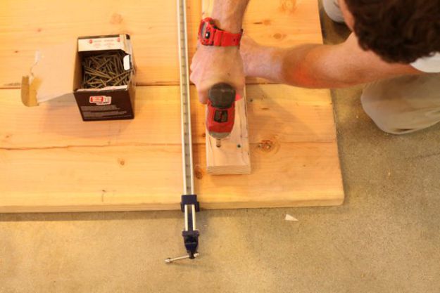 Drill and drive in the other screws | DIY Pipe Leg Table | Workbench Plans And Rustic Furniture Tutorial