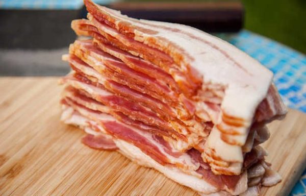 Evenly slice your bacon to make your bacon weave.