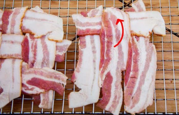 Secure the horizontal bacon strip on your bacon weave.