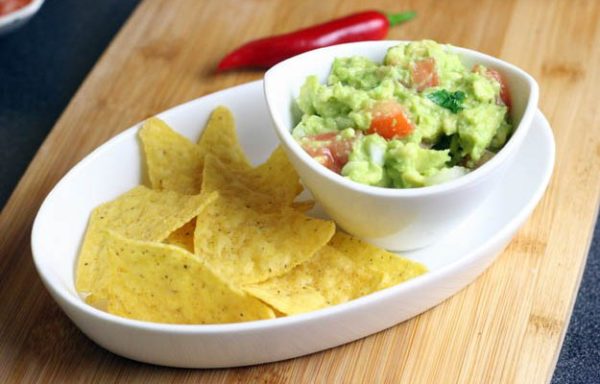 Chips and guacamole dip - perfect combination.