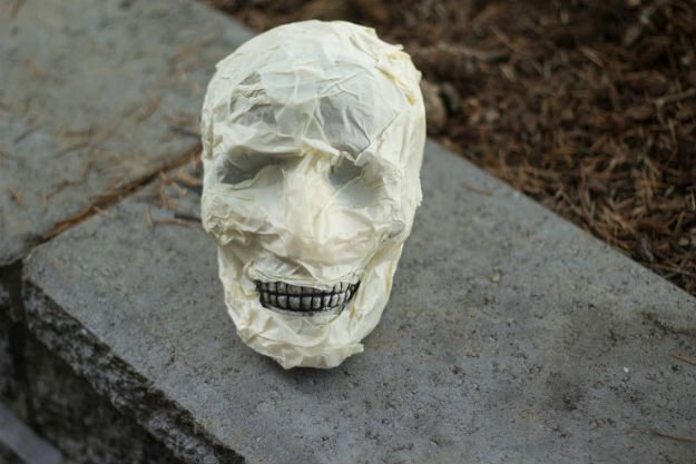 Work on the Skull | Outdoor Halloween Decorations: Make A Rotting Corpse Scarecrow