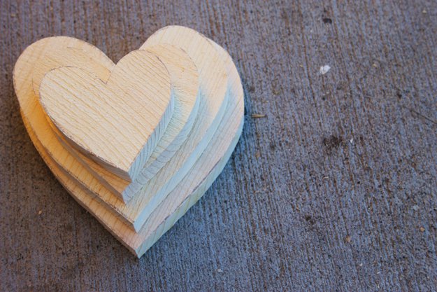 Wooden Valentines Craft Hearts Tutorial | https://diyprojects.com/how-to-make-hanging-hearts/