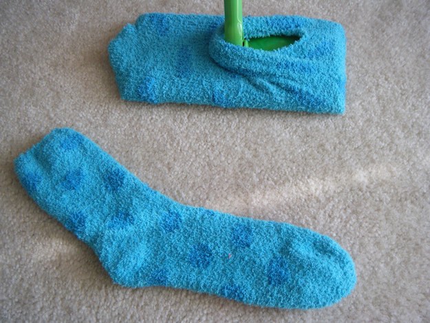 Make us of old socks as Swiffer pads | 10-Minute Cleaning Hacks To Keep Your Home Sparkling
