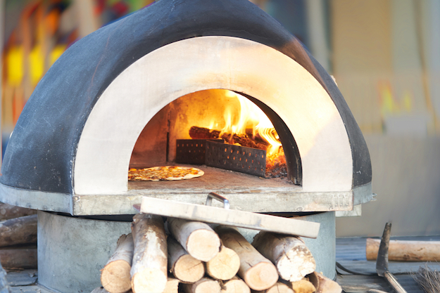 Check out This DIY Outdoor Pizza Oven Turns Any Backyard Into A Pizzeria at https://diyprojects.com/diy-outdoor-pizza-oven/
