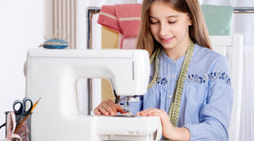 Teenager girl working with sewing machine as a tailor | Easy DIY Projects For Teens Who Love To Craft | Featured