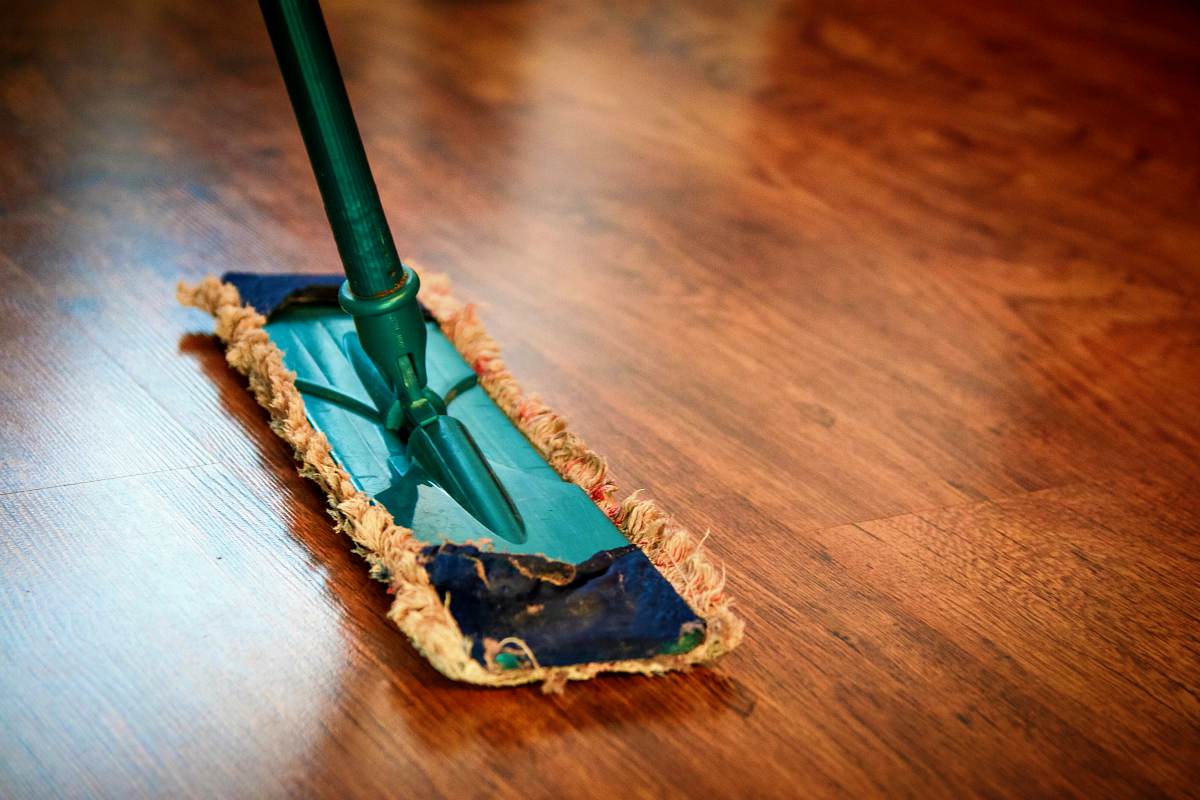 Mop on wooden floor | Day House Spring Cleaning Challenge 