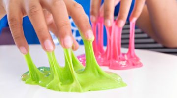 Hand holding homemade toy called slime | DIY Slime Recipes Your Kids Can Make | Featured