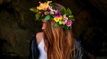 woman standing on dark area with flower crown | How to Make a Flower Crown | Pretty Flower Headbands