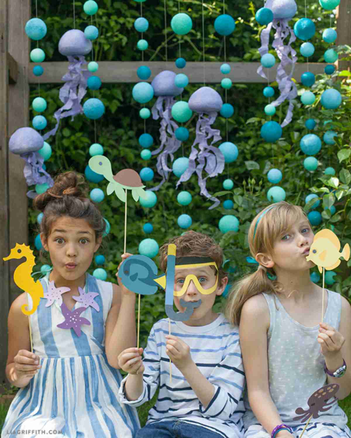 kids on an under the sea photo backdrop | The Best Kids' Party Ideas For All Occasion