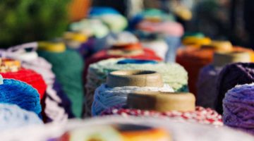 Feature | Assorted color yarns | DIY Sewing Room Organization Ideas From Sewing Mavens