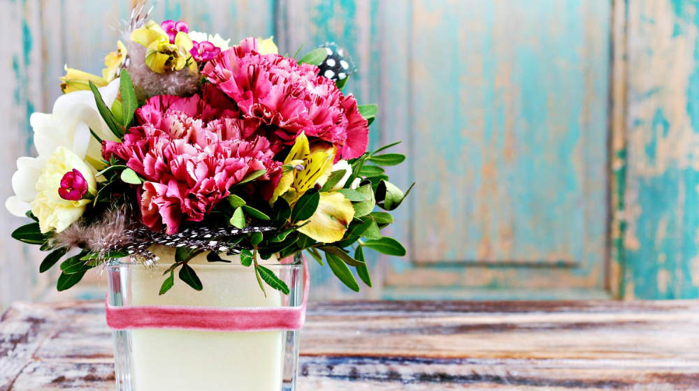 Bouquet of pink carnations and yellow alstroemeria (Peruvian lily or Lily of the Incas) flowers | Our DIY Christmas Ideas Roundup