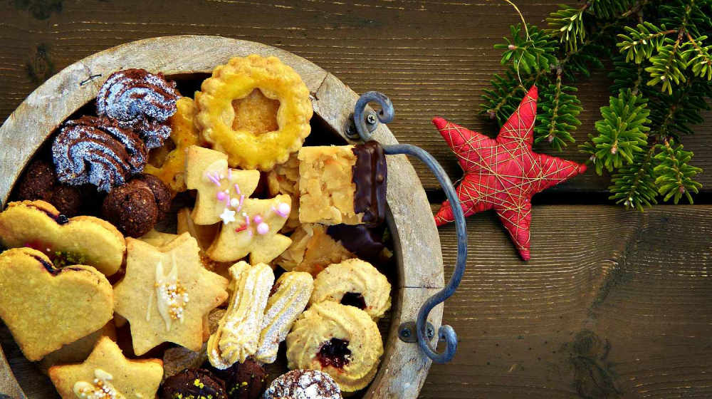 Christmas cookies in a bowl with a wooden background | Our DIY Christmas Ideas Roundup