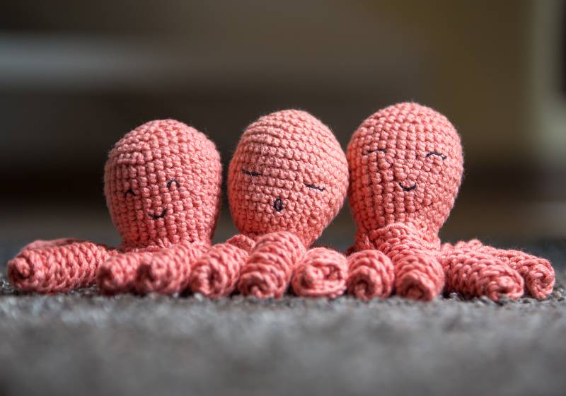 A selection of crochet plush toys in the form of an octopus or jellyfish | Easy Crochet Mini Octopus