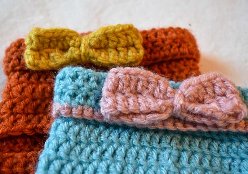Two crocheted bow ties on crocheted clothing | Easy Crochet Bows