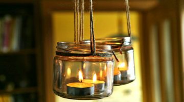 DIY candles in glass jars hanging in interior | 4th Of July Mason Jar Lanterns | DIY Lighting And Decor | Feature
