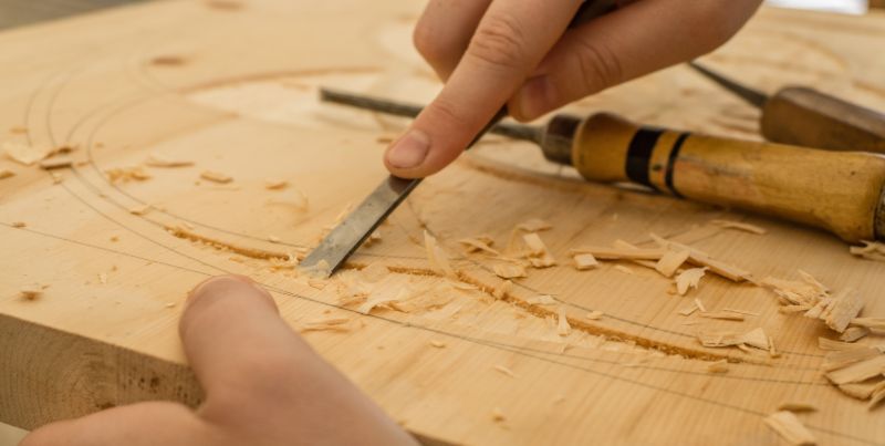 wood carving using a small Chisel | Top 7 Wood Carving Tools For Beginners And Beyond