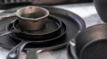 variety of cast iron | How To Restore A Rusty Cast Iron Griddle Using A Ball Of Steel Wool | Featured