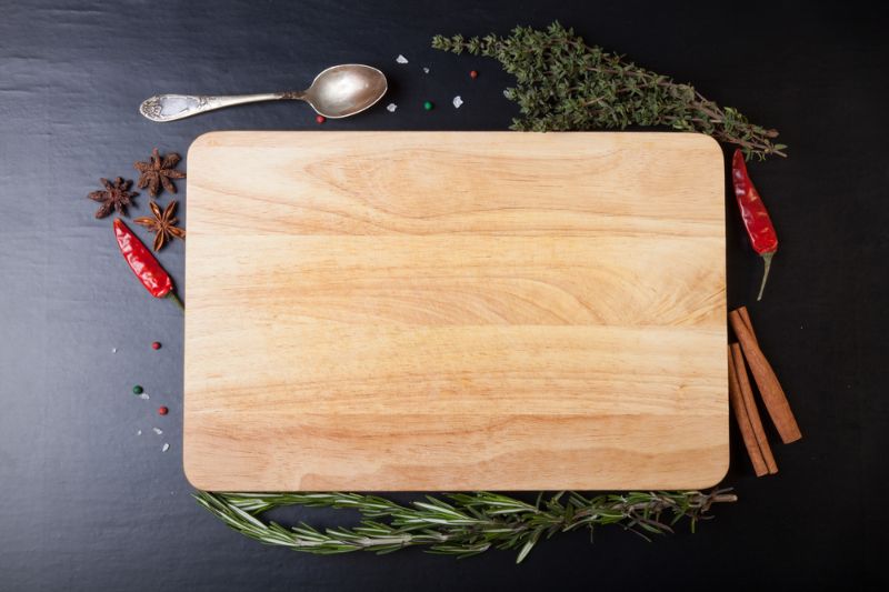 cutting-board-rosemary-thyme-colored-chili | chopping board
