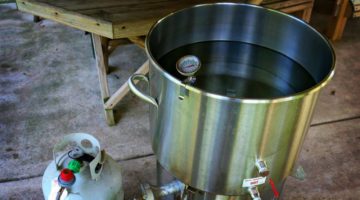 heating-water-make-home-brewed-beer | Learn How To Make A Still For Self Reliance | Featured