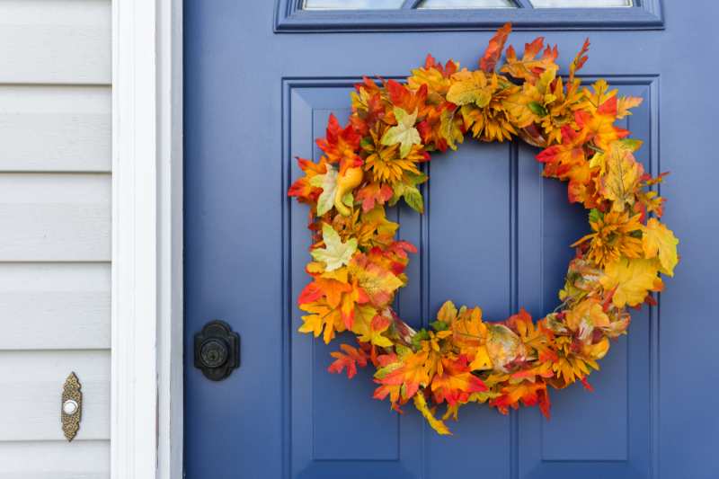 closeup-front-door-decorative-autumn-wreath | fall