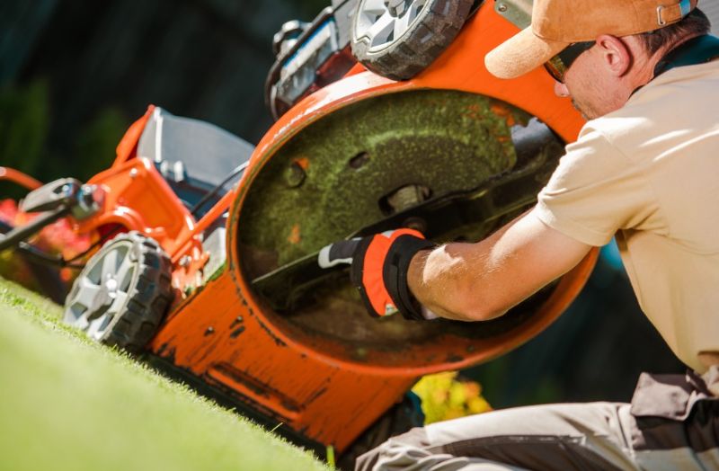 caucasian-gardener-his-30s-checking-lawn | lawn mower repair parts