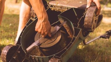 gardener-repair-fix-lawn-mower-garden | A Beginner’s Guide To Lawn Mower Repair | Featured