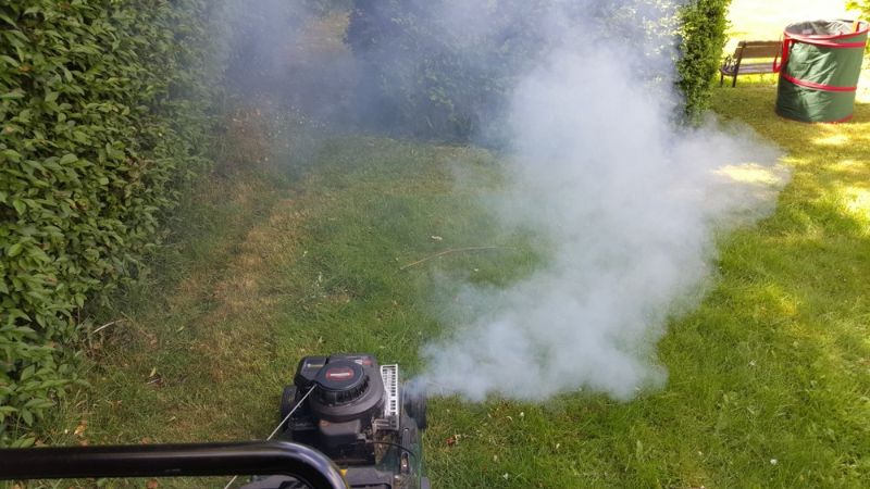 smoking-petrol-lawn-mower | smoking lawn mower