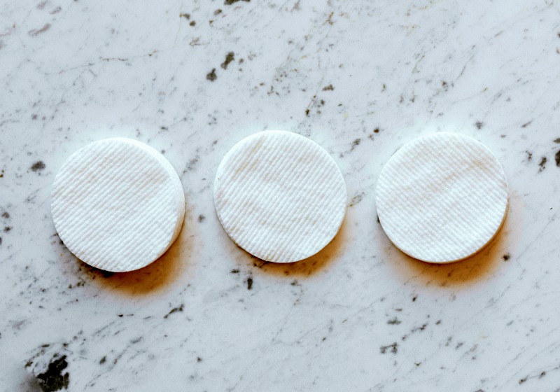 identical round shaped cotton-pads-on marble surface 4202383 | Make Your Own Fire Starter At Home | ## DIY Fire Starter Ideas