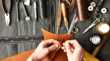 man-working-leather-using-crafting-diy | Best Leather Crafting Tools On Amazon You Need To Purchase | Featured
