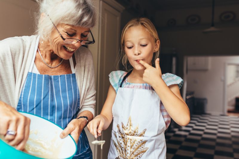senior-woman-apron-making-batter-cake | personalized grandma gifts
