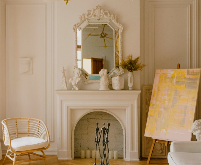 white wooden door near white wooden chair | how to build a simple fireplace mantel