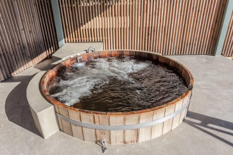 wooden-hot-tub-filled-water-on | build a hot tub