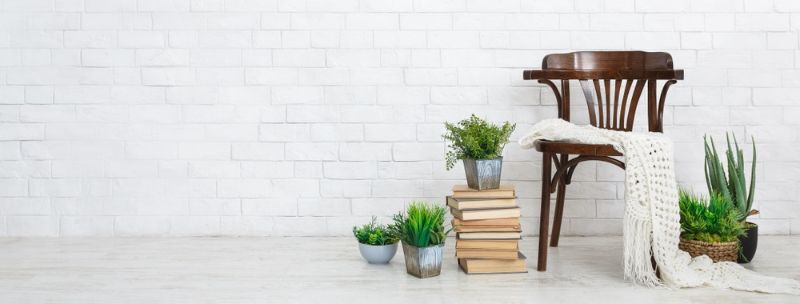vintage-chair-home-plants-stack-books | plant stand