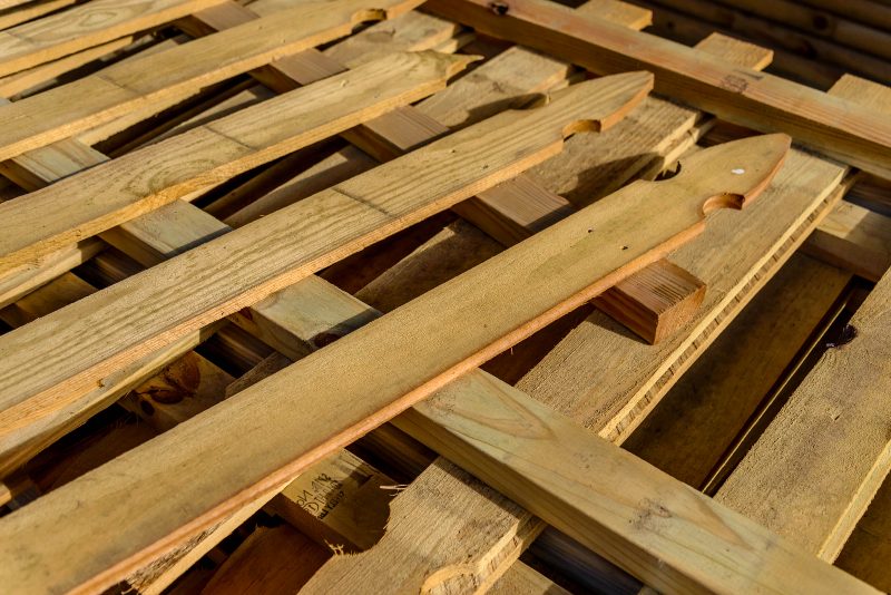 Stacked Wood Fence Lumber | DIY Kayak Rack