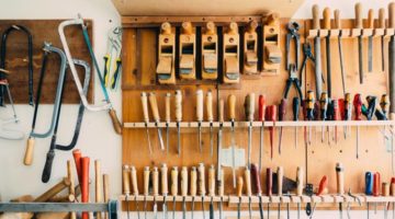 assorted handheld tools in tool rack | woodworking tools amazon | featured
