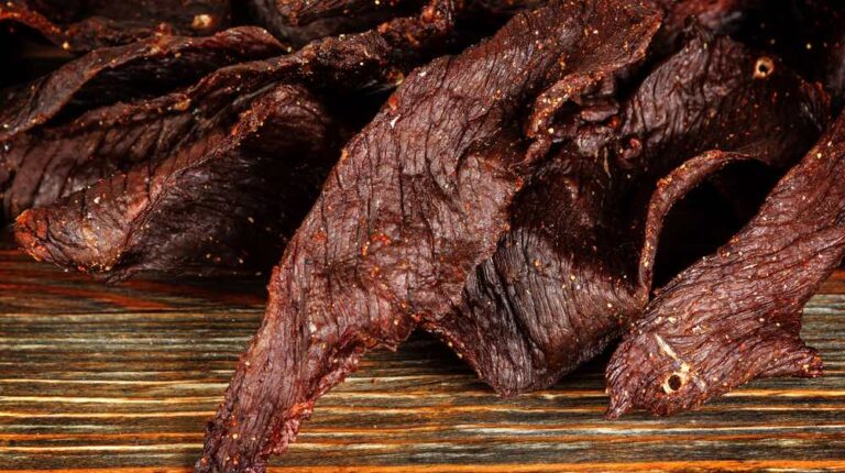 Beef jerky on a wooden board | How to Make Beef Jerky | Beef Jerky Recipe