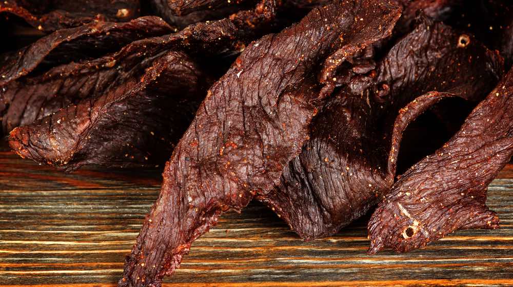 Beef jerky on a wooden board | How to Make Beef Jerky | Beef Jerky Recipe