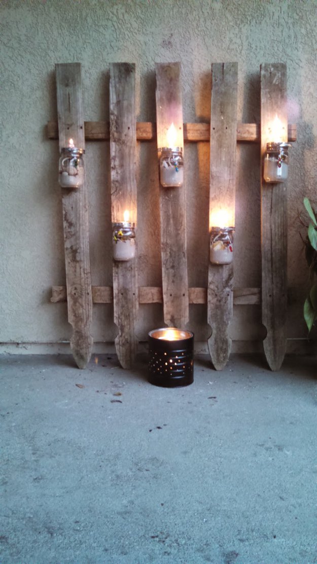 DIY Mason Jar Lantern Ideas for the Backyard | https://diyprojects.com/fence-with-mason-jar/