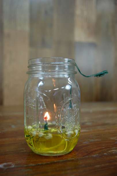 How to Make a Mason Jar Oil Lamp, see more at https://diyprojects.com/mason-jar-olive-oil-lamp