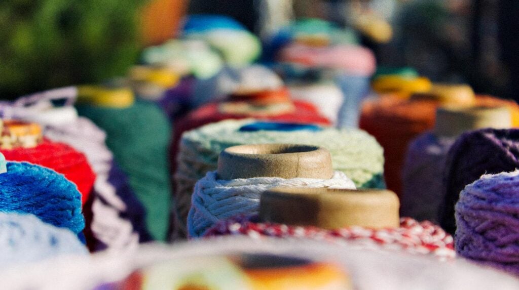 Feature | Assorted color yarns | DIY Sewing Room Organization Ideas From Sewing Mavens
